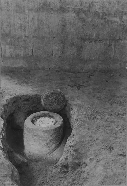 Turquoise mosaic plaque in limestone urn at the Temple of Chac Mool