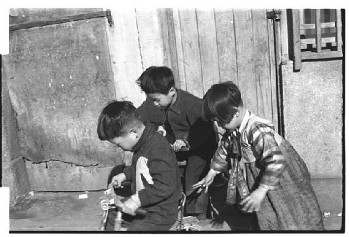 Children playing with bicycles