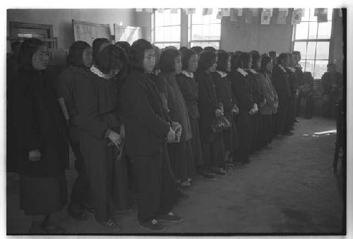 Several young women standing