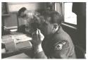 German Red Cross worker smoking cigarette