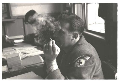 German Red Cross worker smoking cigarette