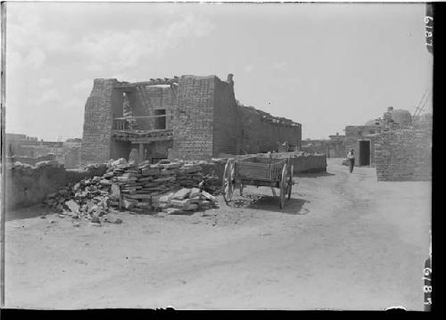 Cart in front of old church, Zuni