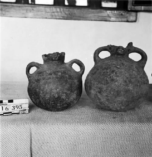 Two Small Pottery Jars with Animal Faces on Necks of Vessels