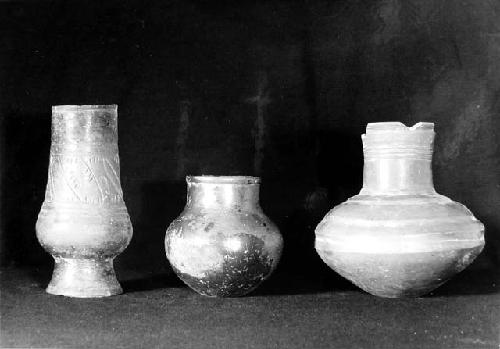 3 Plumbate Vessels  a:Tapered vase, pedestal base  b: standard jar  c: girdled s