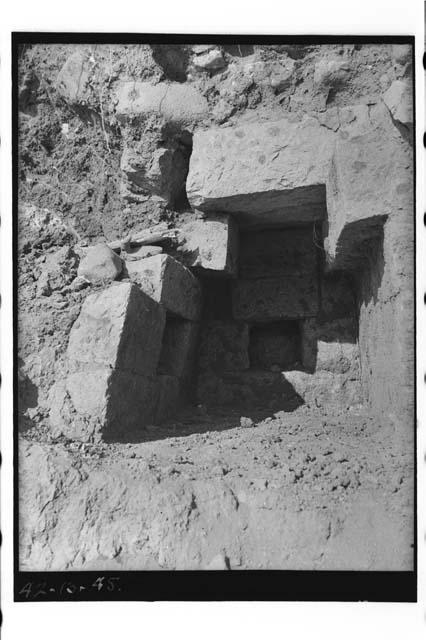 Emptied tomb burial on river bank, about 200m south of Acropolis; Dig 1-42