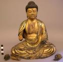 Old carved wooden buddha