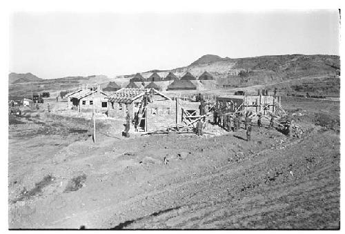 Workers building a structure