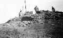 Excavating southeast corner of mound