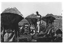 General Whitcomb walking among workers at cemetery