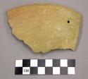 Plain red sherd with perforation - kill hole?
