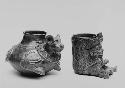 Two effigy vessels. Left 16/3463, Right 16/3462