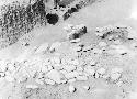 Grave excavation 3-31 showing stones in east end of trench