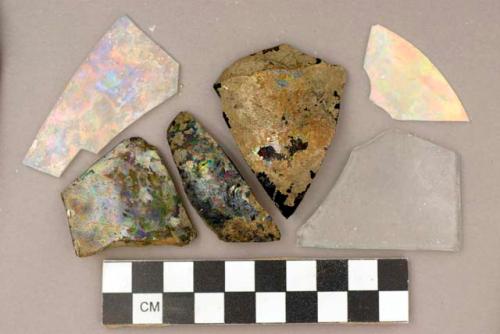 Glass, bottle glass, clear and irridescent fragments