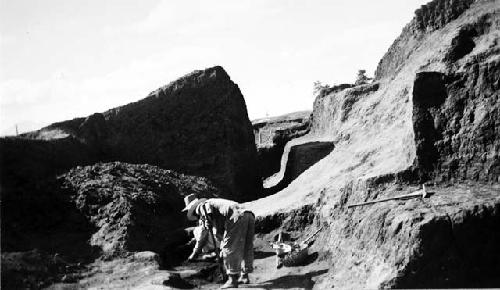 Men excavating east terraces of adobe structure, Mound C-III-10