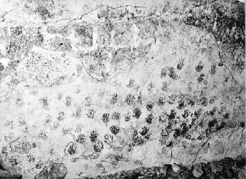 Red hands on west wall of Str 1A1; South room under stairway