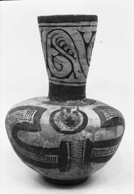 Decorated polychrome effigy with ring base, from grave 1, number 317