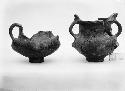 Two broken pottery vessels from grave 3 exacavation