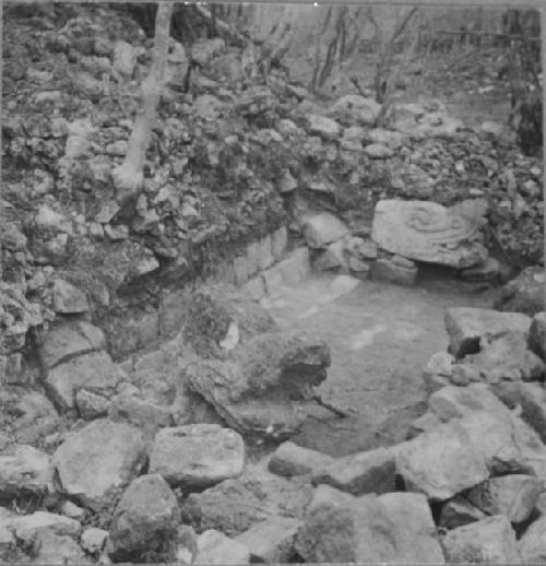 Foot of stairway and serpent heads at Structure Q218