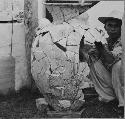 Large plastered unslipped jar on floor of rear room[?],  Str. R-86.