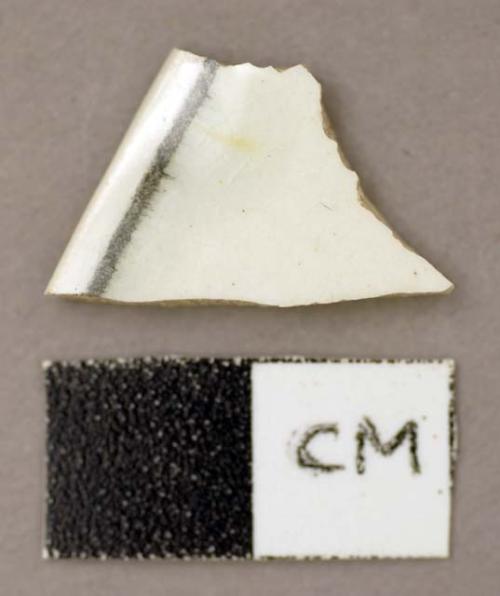 Ceramic, porcelain, sherd with black band on one side