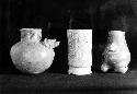 3 pottery vessels  a: Plumbate standard jar, effigy style I, applied head  b: Fi