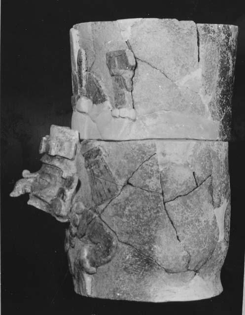 Pottery double boiler effigy vase. Figure of divine God on one side