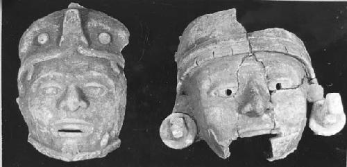 2 effigy censer heads