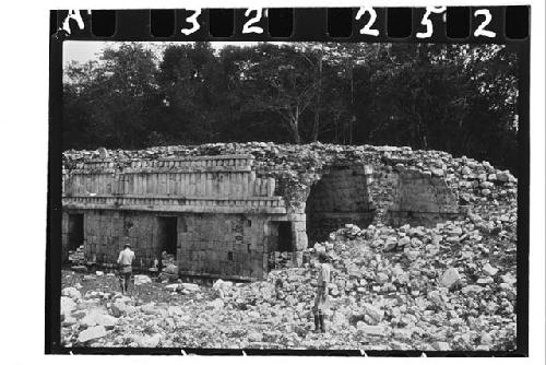 Men in front of Group 1; Structure 6; West end