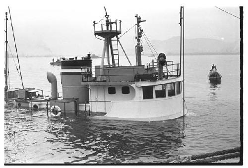 Sunken U.S. Army tugboat being raised