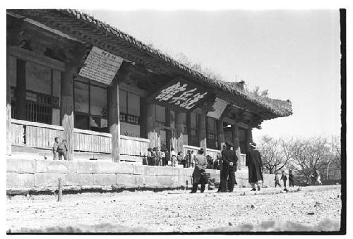 People looking at building