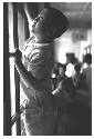 Boy climbing a window