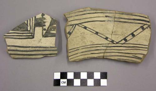 Ceramic, body sherds, black linear designs on white, one mended