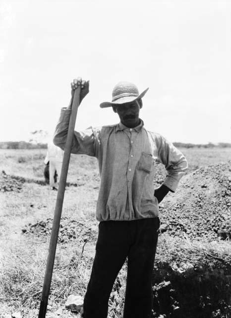 Rosa Coronado at dig site 2 with shovel