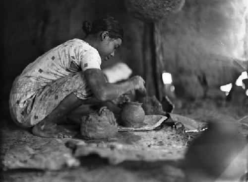 Woman making pottery, House of Lorenzo