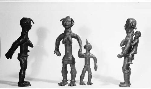 Three bronze female figurines