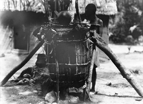 Man fermenting cocoa beans