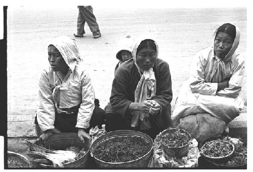 Women selling spices outdoors