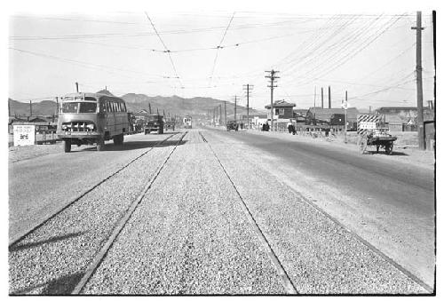 Vehicles going down a road