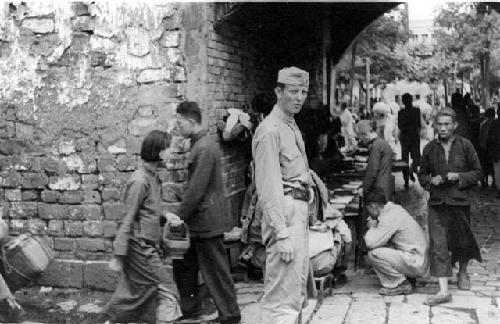 People on a cobblestone street