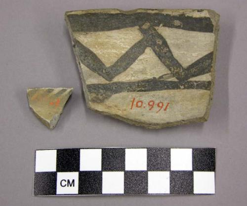 Ceramic, sherds, black design on white on one side, one bowl rim sherd