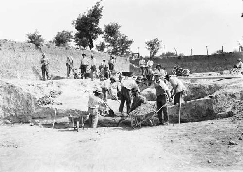 View of men clearing pit 5A