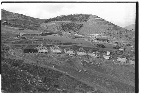 Row of structures being built