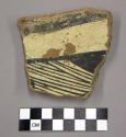 Polychrome rim sherd with orange and black linear design on cream slip