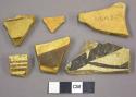 Black-on-yellow potsherds