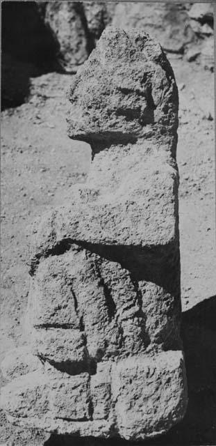 Stone idol at Structure Q214