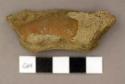 Ceramic, terra cotta, rim or ring base sherd possibly, glaze on exterior