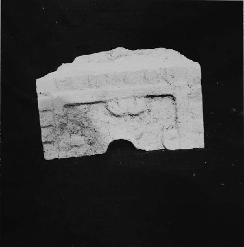 Sculptured stone from altar mask, Str. R86