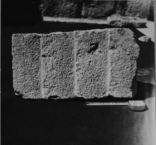 Structure R-87.  Sculptured stone in debris of front (central) room