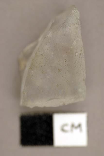 Glass, colorless bottle glass, thick and slightly opaque fragment