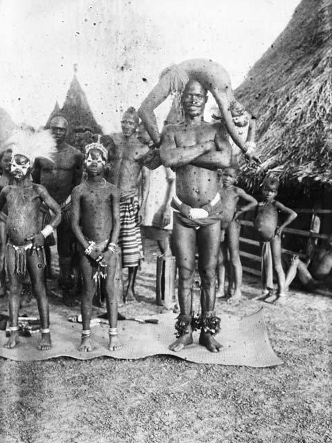 Snake men performing in village